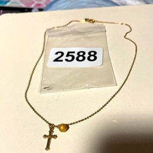 Sarah Coventry child’s gold tone cross necklace. NWOT